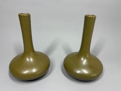 A pair of Chinese Qing dynasty tea-dust-glazed porcelain bottle vases
