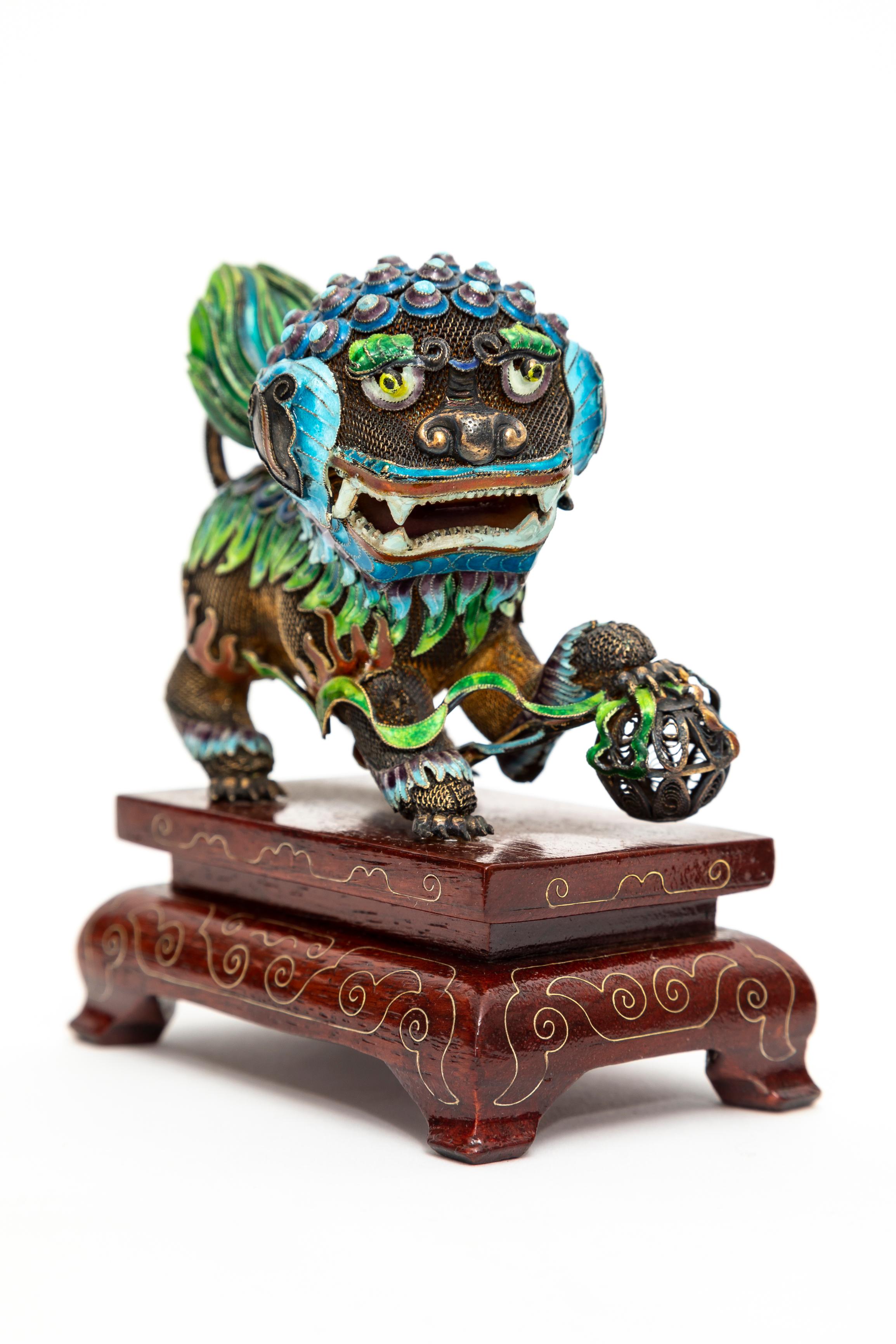 Mid-20th Century A Pair of Chinese Silver Filigree Enameled Foo Dogs on Carved Wood Stands For Sale