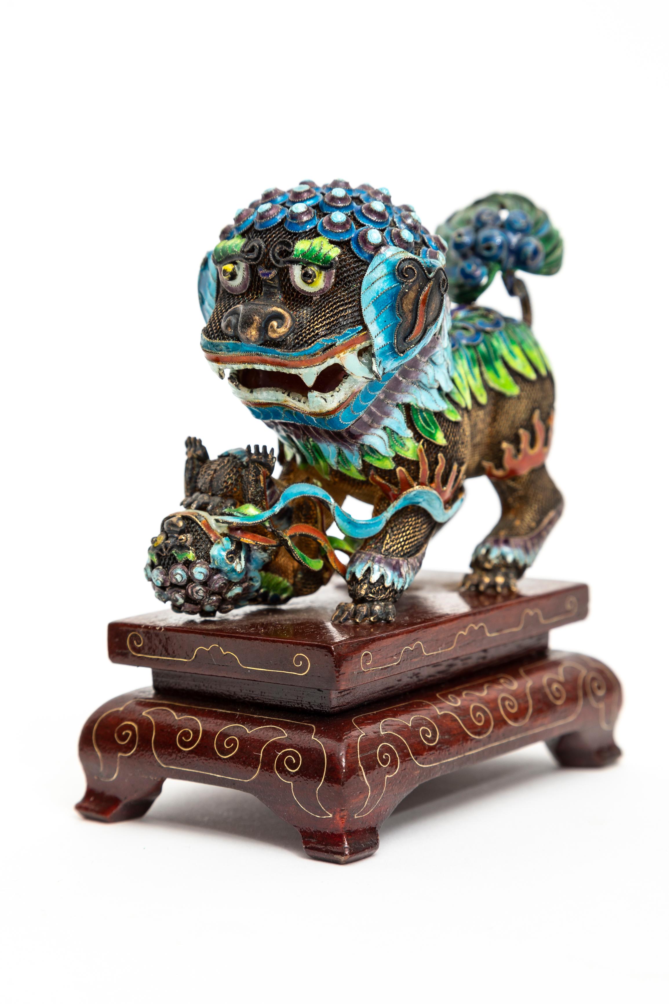 A Pair of Chinese Silver Filigree Enameled Foo Dogs on Carved Wood Stands For Sale 1