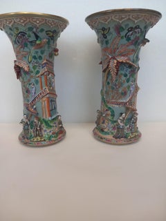 A pair of Chinoiserie style French Porcelain Vases