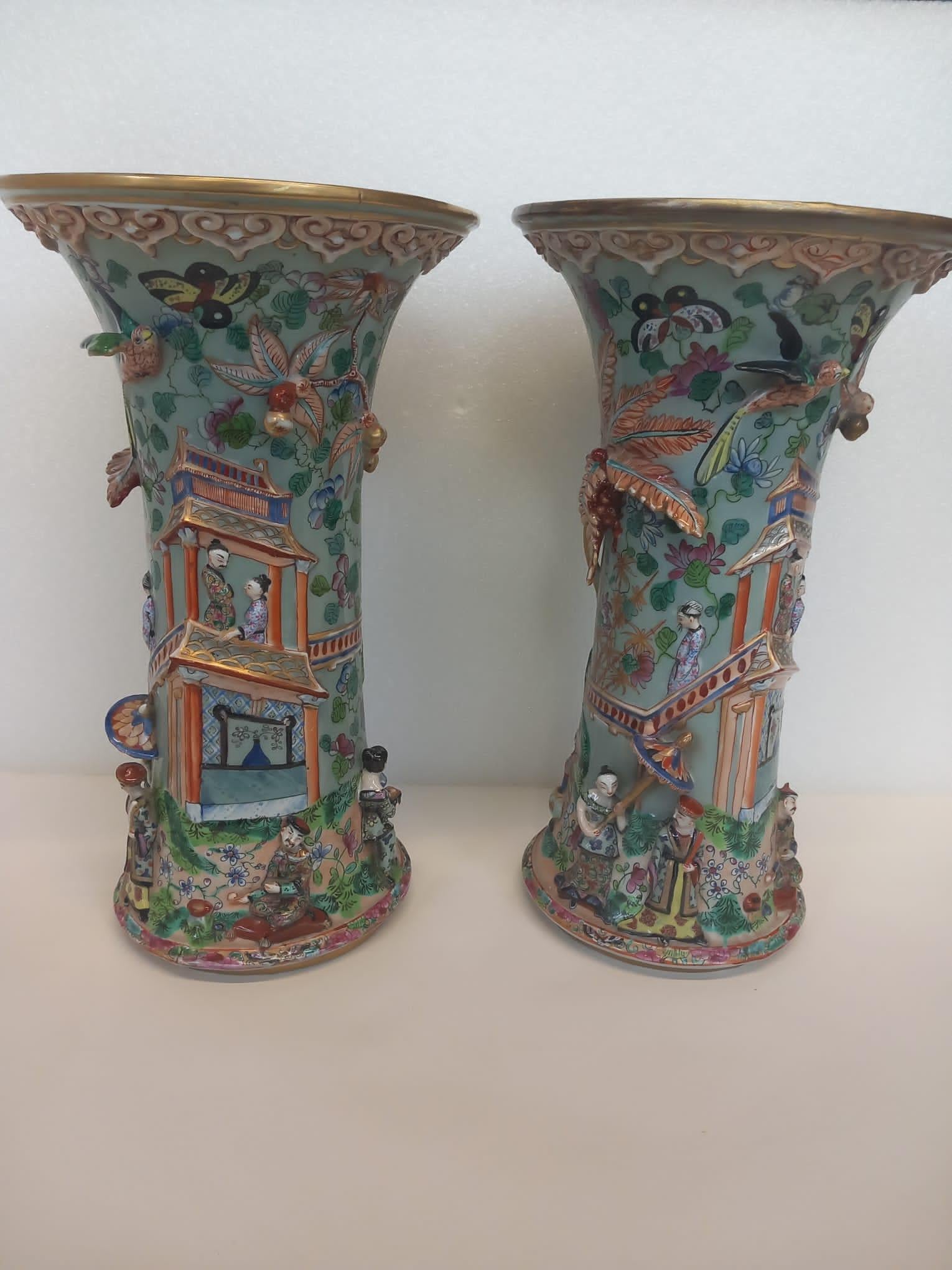 Hand-Painted A pair of Chinoiserie style French Porcelain Vases For Sale