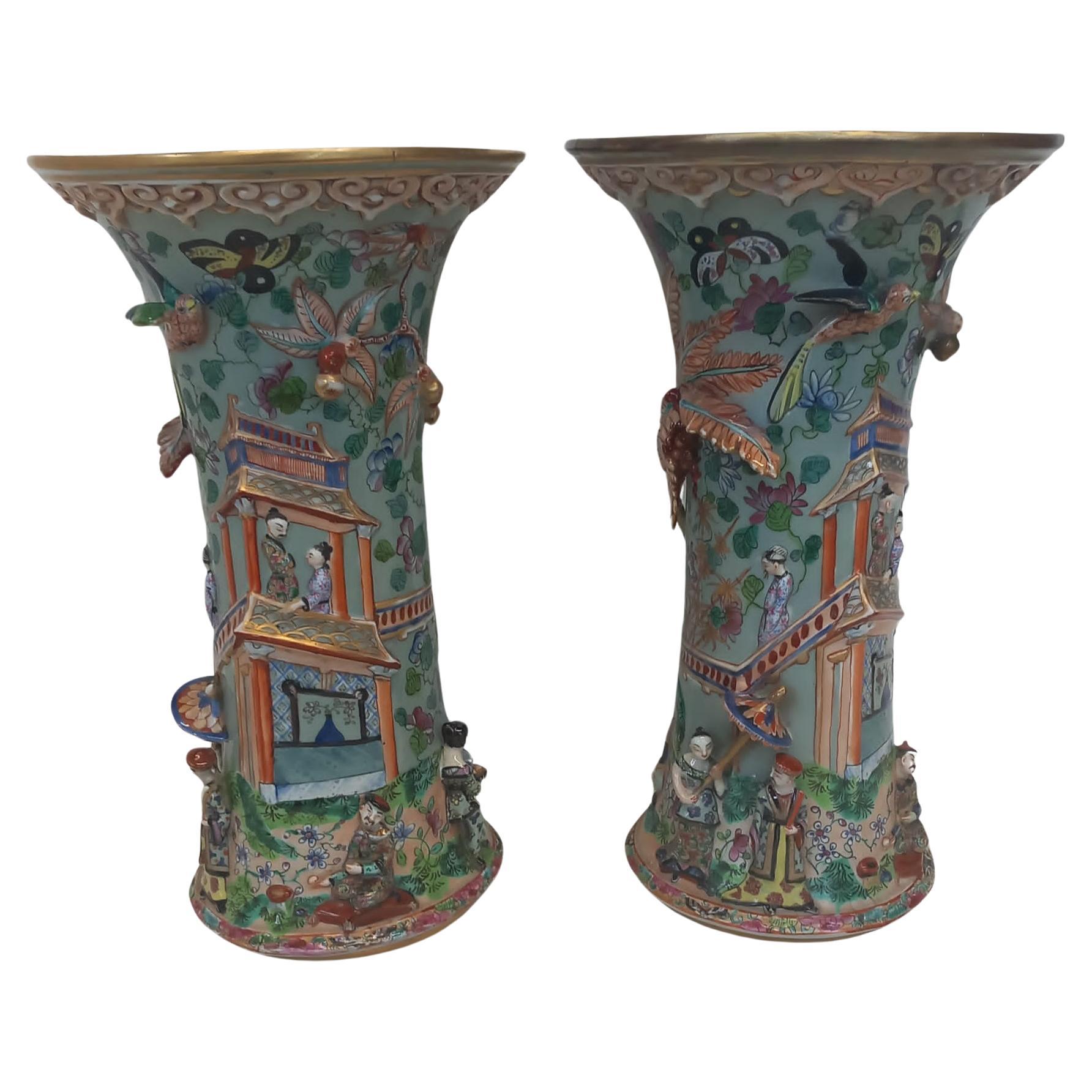 A pair of Chinoiserie style French Porcelain Vases For Sale