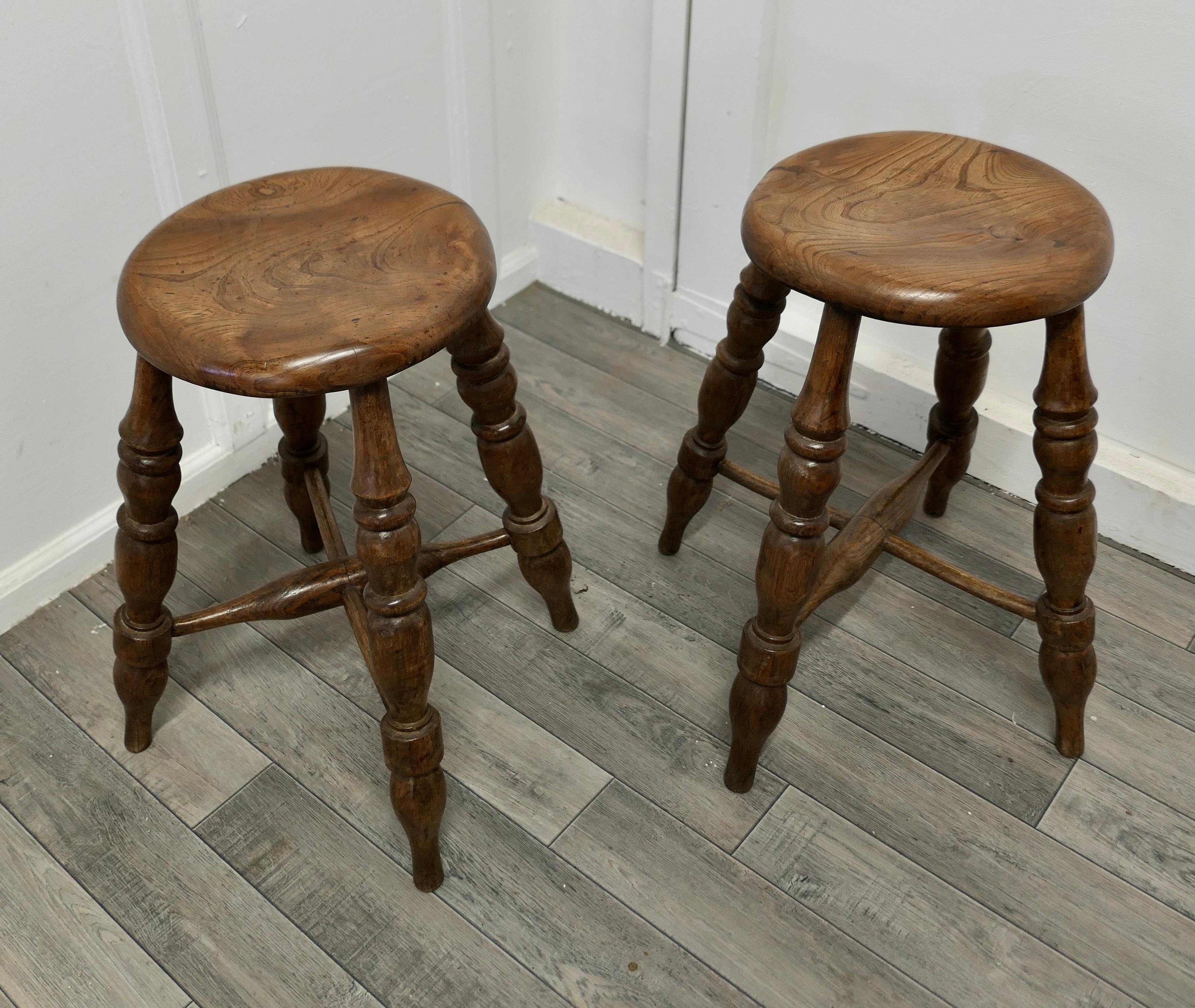 A Pair of Chunky Victorian Elm Farmhouse Kitchen Stools

Lovely country pieces with a superb natural colour and a gorgeous patina, they have thick elm seats with sturdy turned ash legs
The stools are good and sound, they are 21” high, the seats are