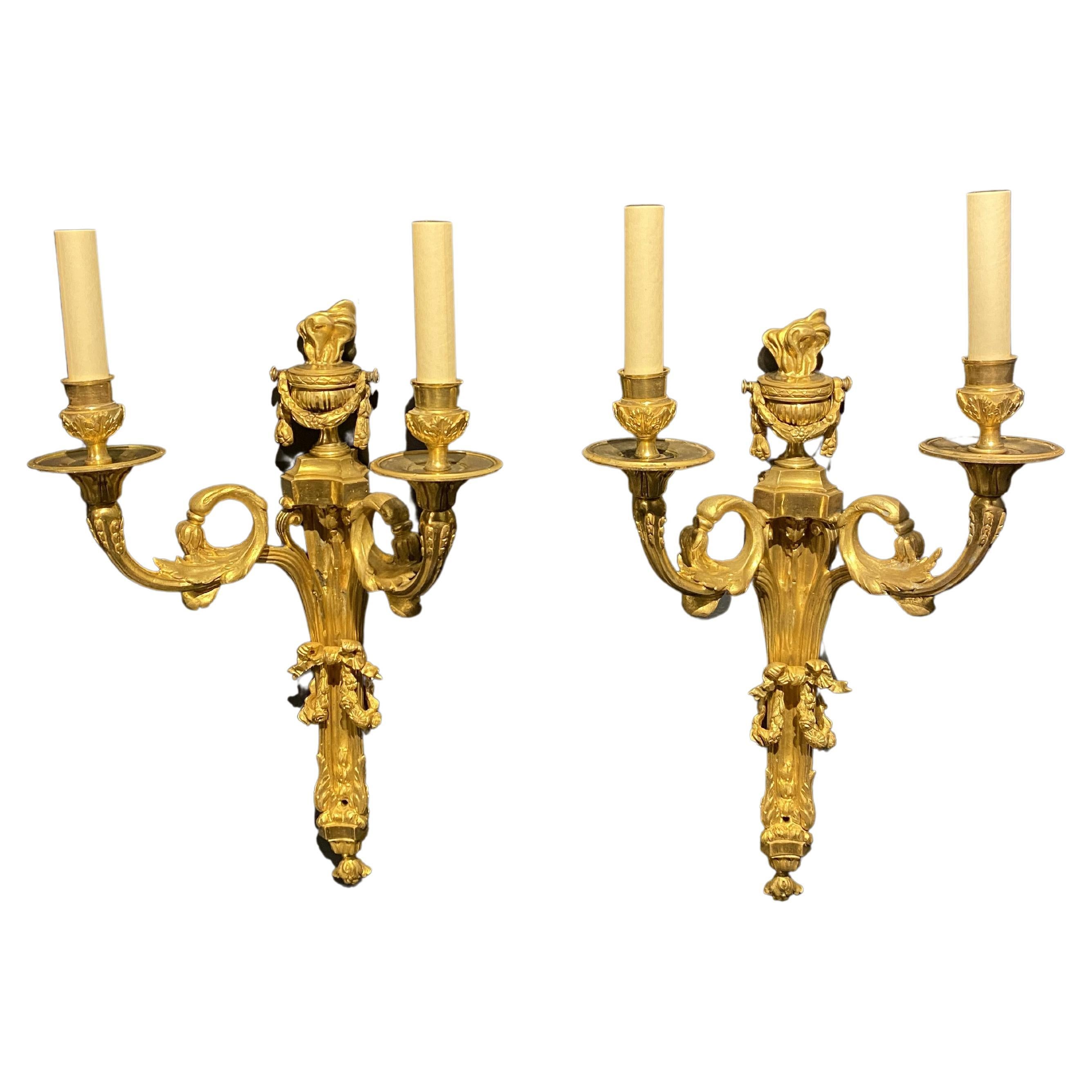 A pair of circa 1900's French gilt bronze sconces with twisted arms