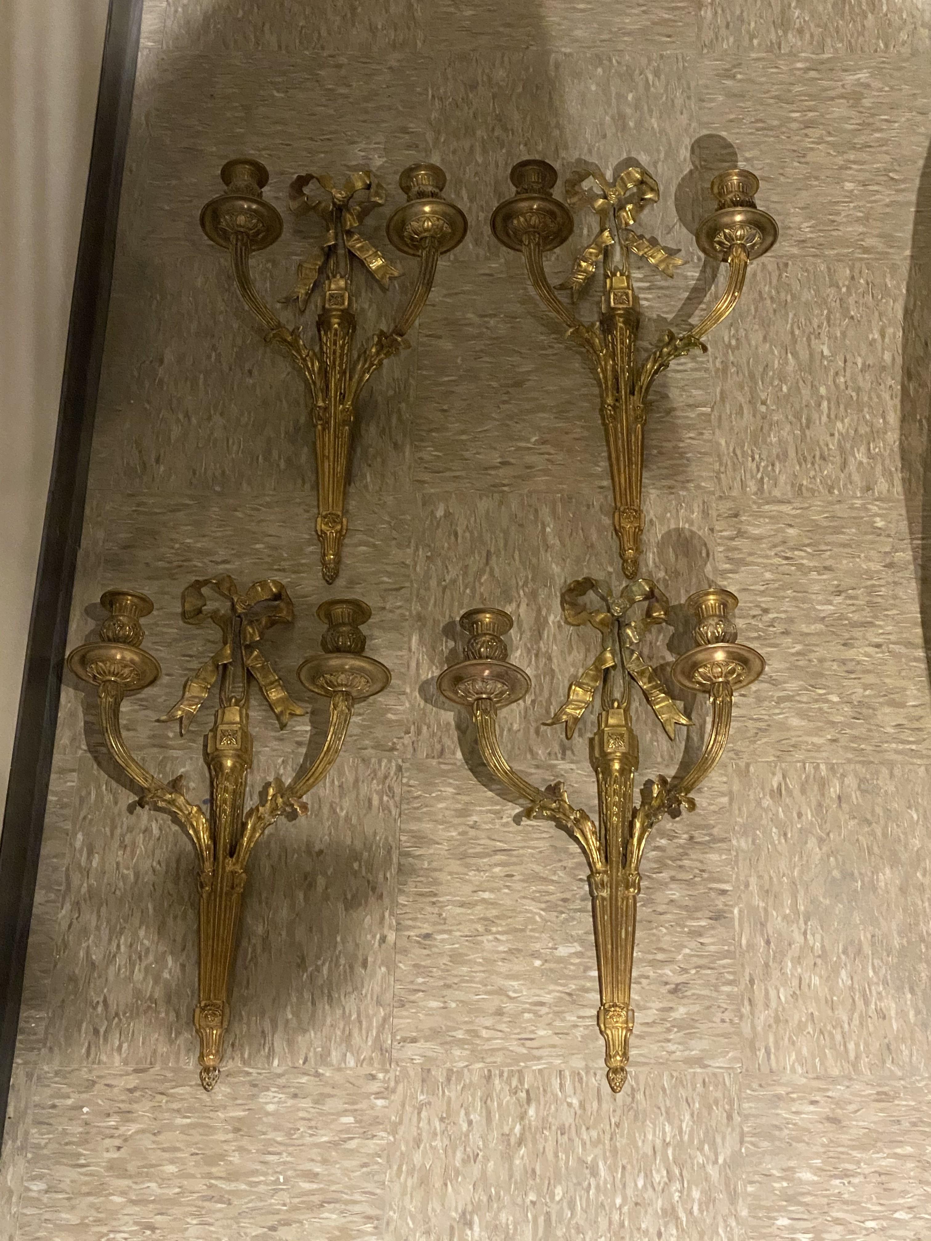 Louis XVI Pair 1900's French Gilt Bronze Sconces with Ribbons For Sale