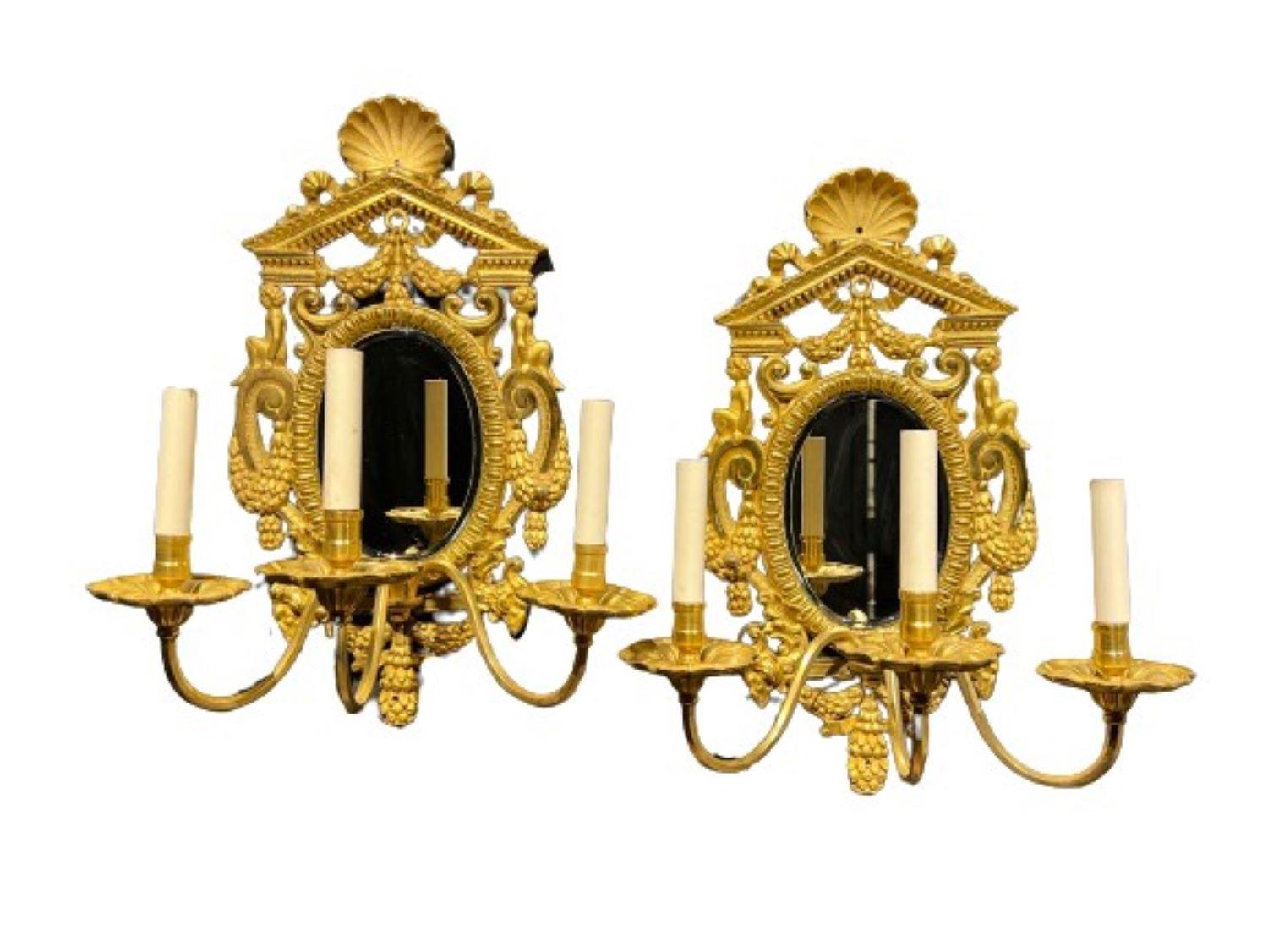 Early 20th Century 1900's Caldwell Neoclassic Gilt Bronze and Mirror Sconces 3 Lights For Sale