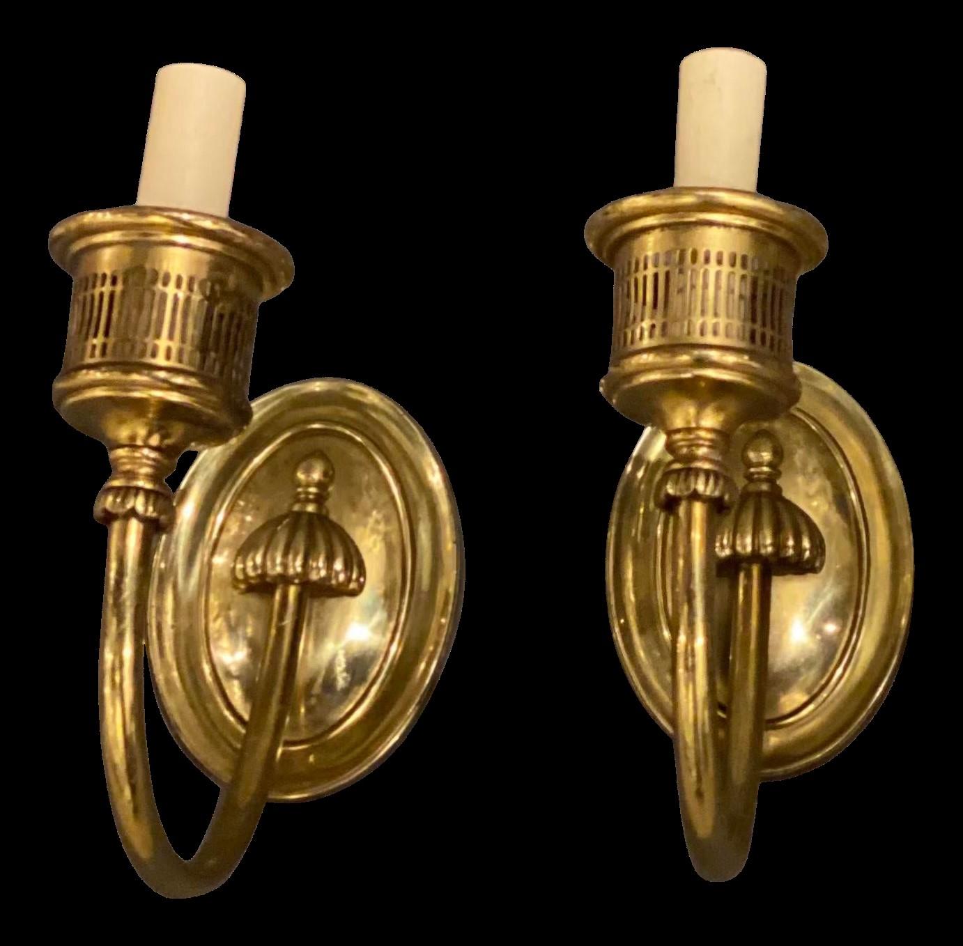 A pair of circa 1920's gilt bronze Caldwell sconces