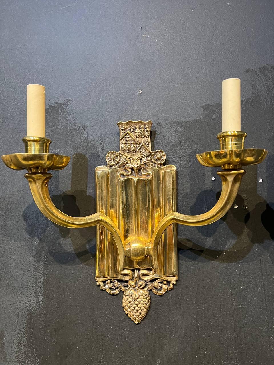 Neoclassical 1920’s Caldwell Gilt Bronze Sconces with Shield design  For Sale