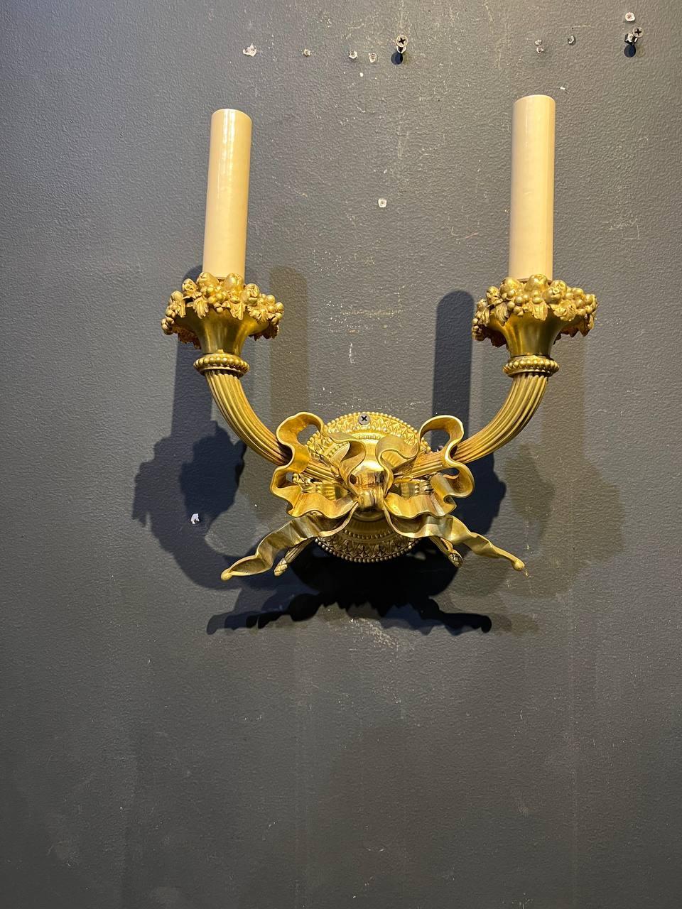 American Pair of 1920's Caldwell Gilt Bronze Sconces with Ribbon For Sale