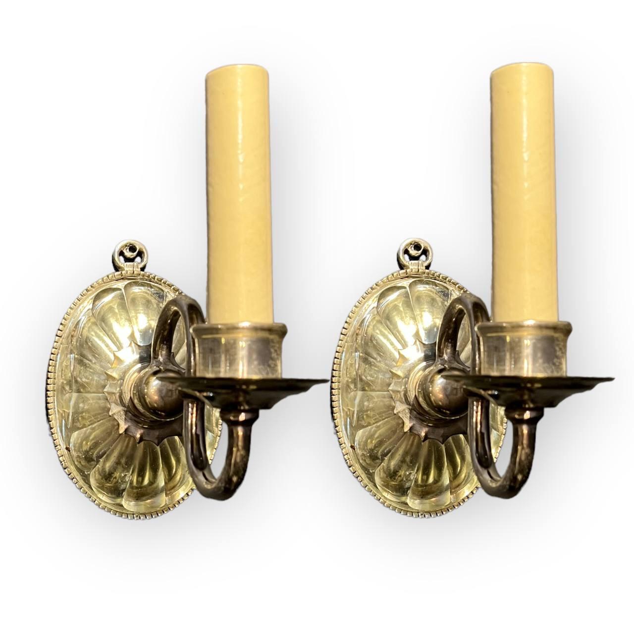 Silvered Pair of 1920's Caldwell One Light Sconces with Molded Glass For Sale