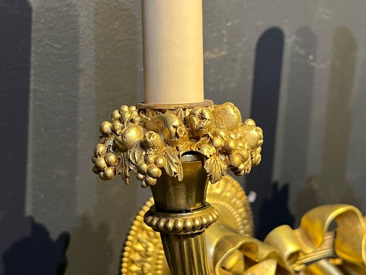 Pair of 1920's Caldwell Gilt Bronze Sconces with Ribbon In Good Condition For Sale In New York, NY