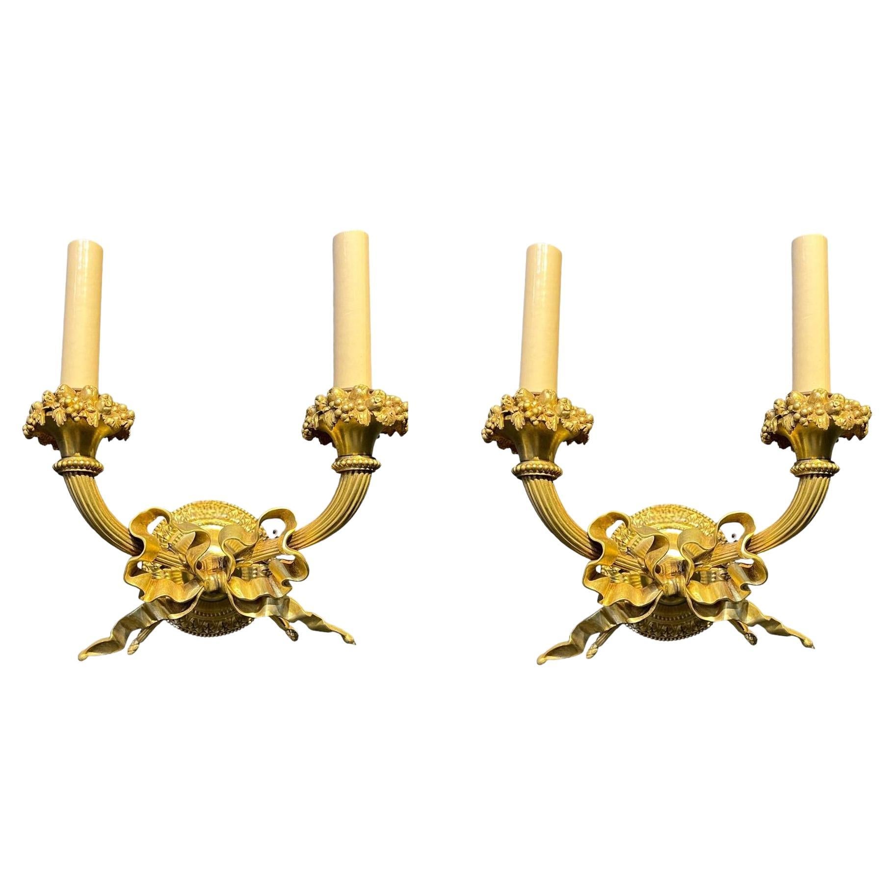 Pair of 1920's Caldwell Gilt Bronze Sconces with Ribbon For Sale