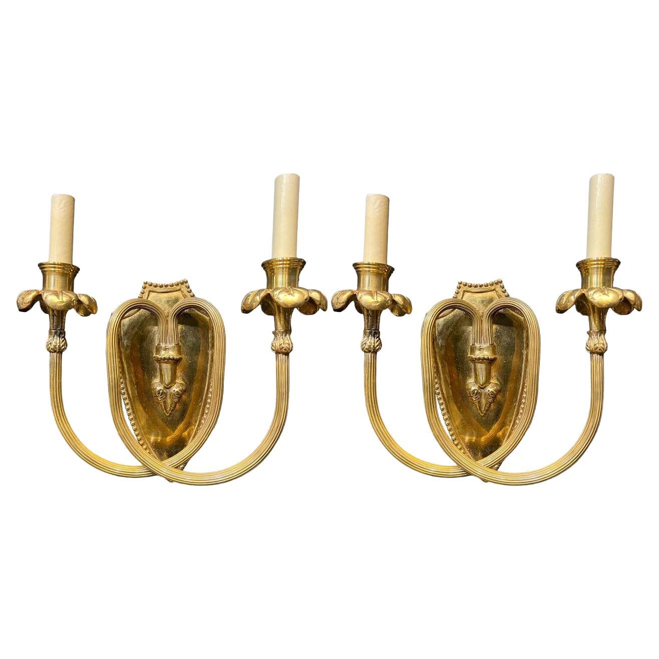 1920’s Caldwell Bronze Sconces with Scrolled Arms For Sale