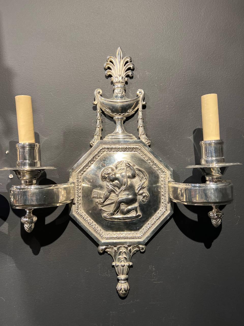 Neoclassical 1920's Caldwell Silver Plated Cherubs Sconces For Sale