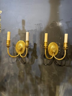 Coppia di sconsiglieri in bronzo dorato Caldwell degli anni '20