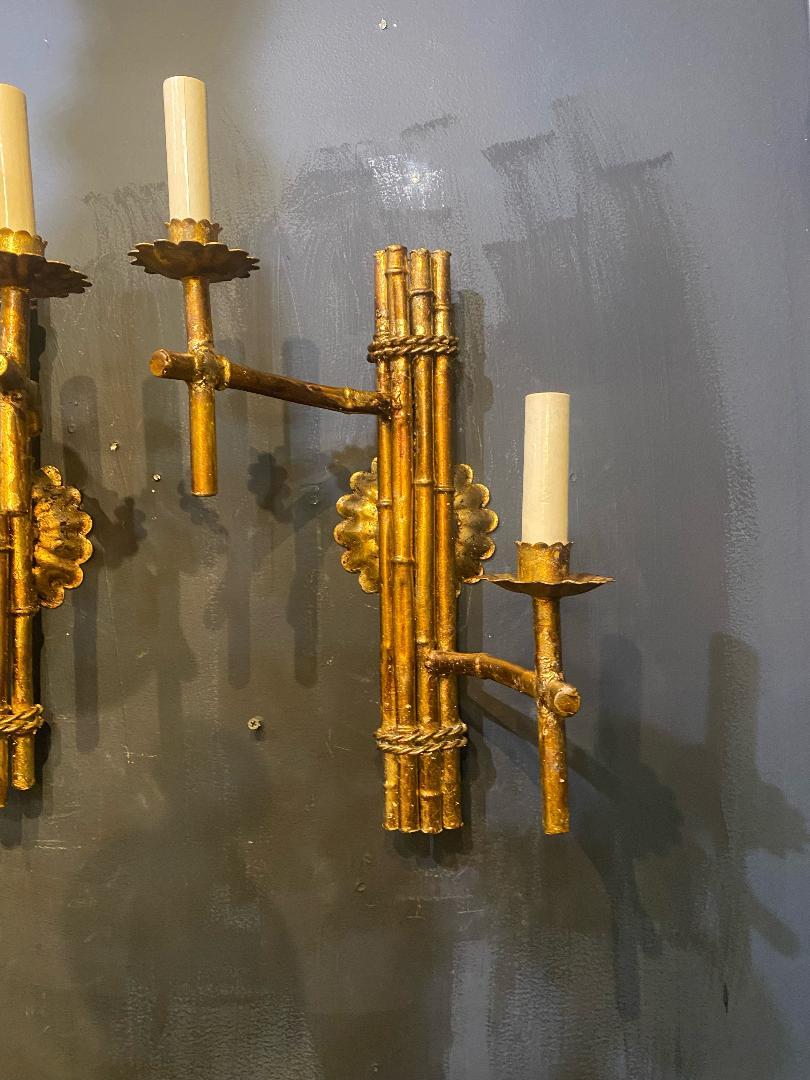 A pair of circa 1940's French Bagues gilt metal Faux Bamboo design sconces
