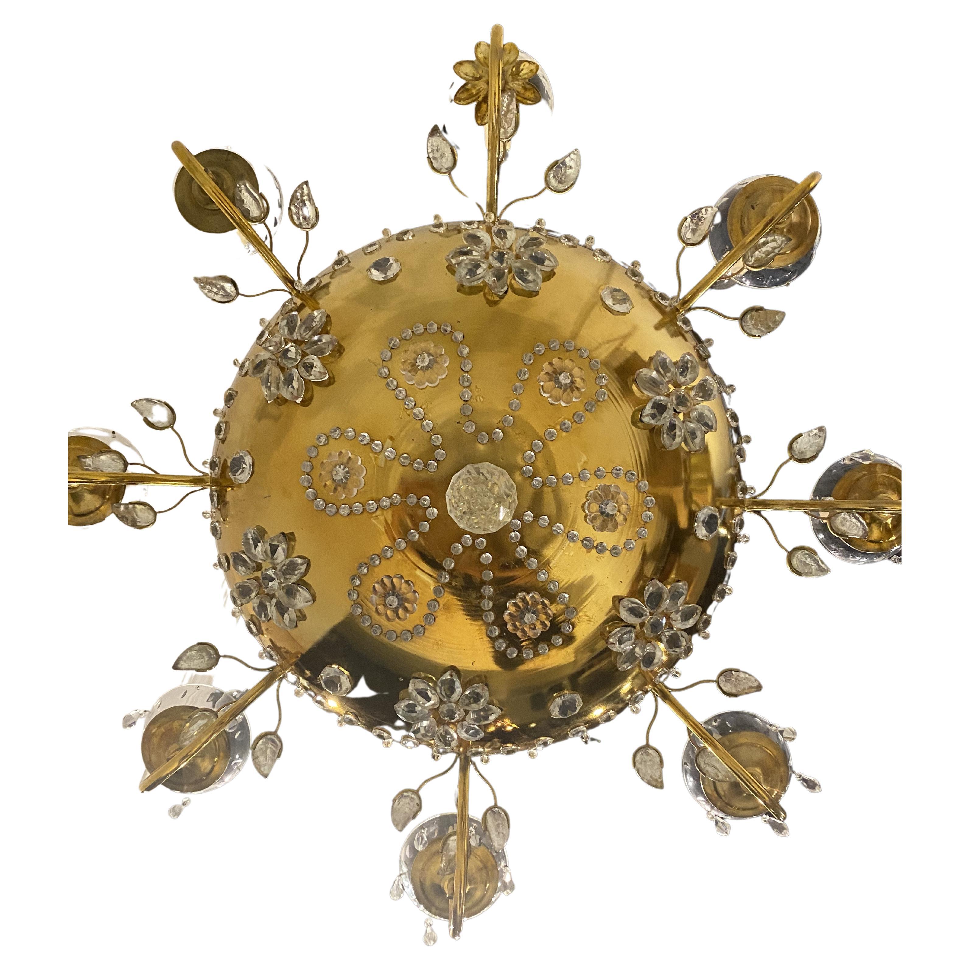 A circa 1930's French gilt bronze chandelier with beaded crystal flowers on body. Available pair 