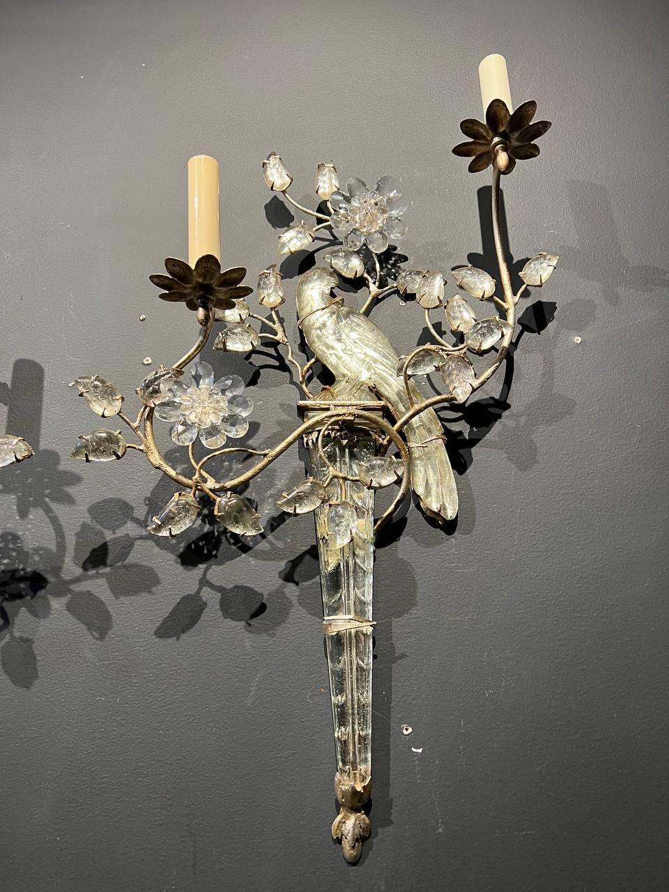 A pair of circa 1930's French silvered leaf metal sconces with glass birds design