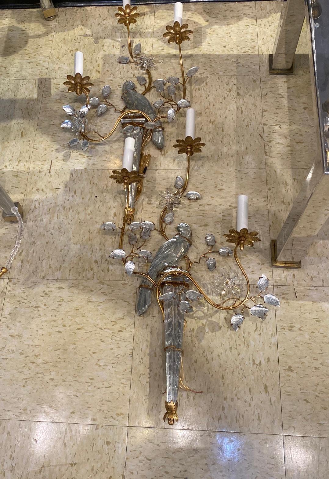 A pair of circa 1930's French Bagues gilt metal 3 lights sconces with crystal birds design