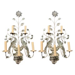 A pair of circa 1930's French Bagues sconces with double birds.