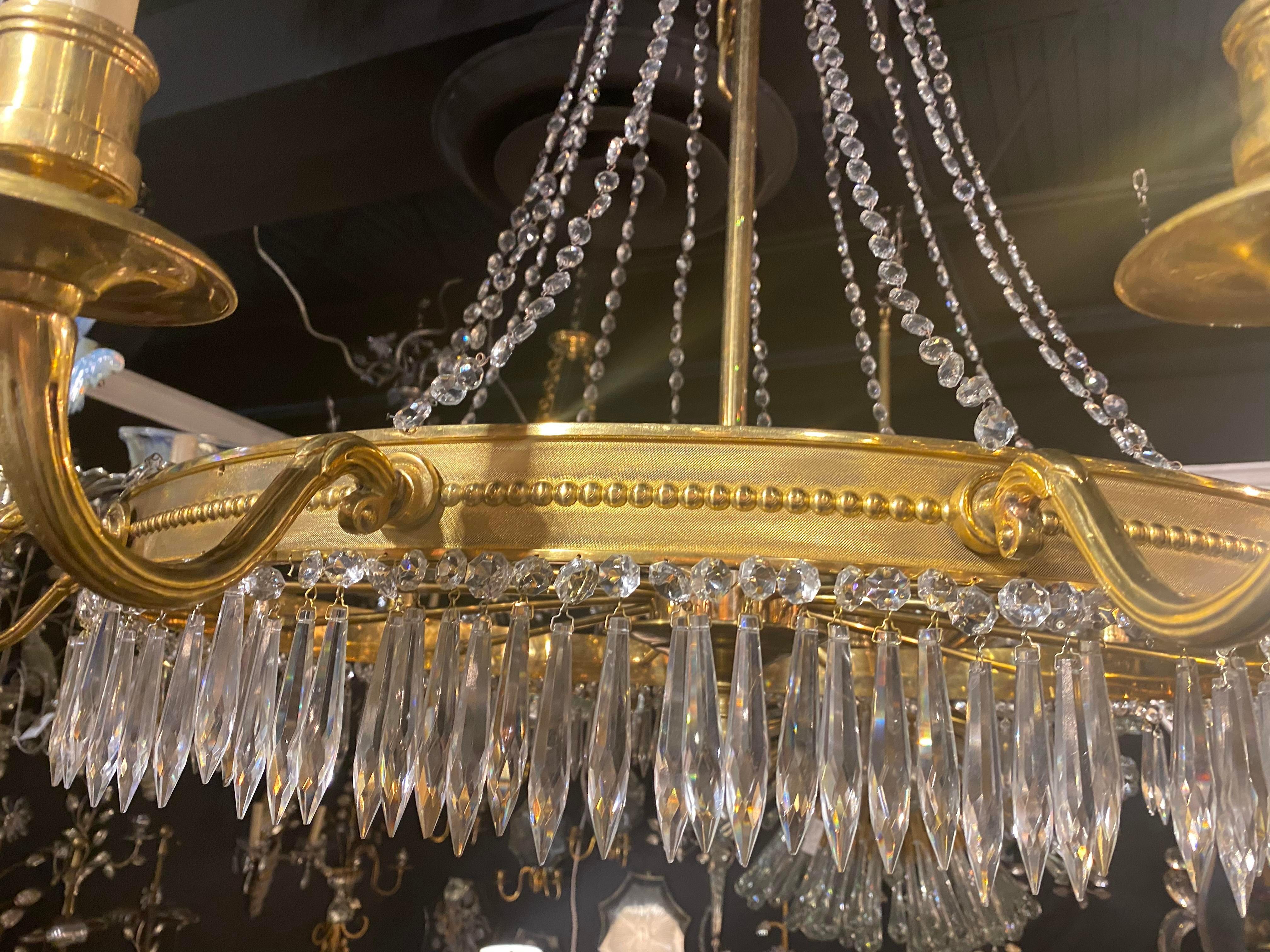 1930's French Gilt Bronze 12 lights Chandelier In Good Condition For Sale In New York, NY