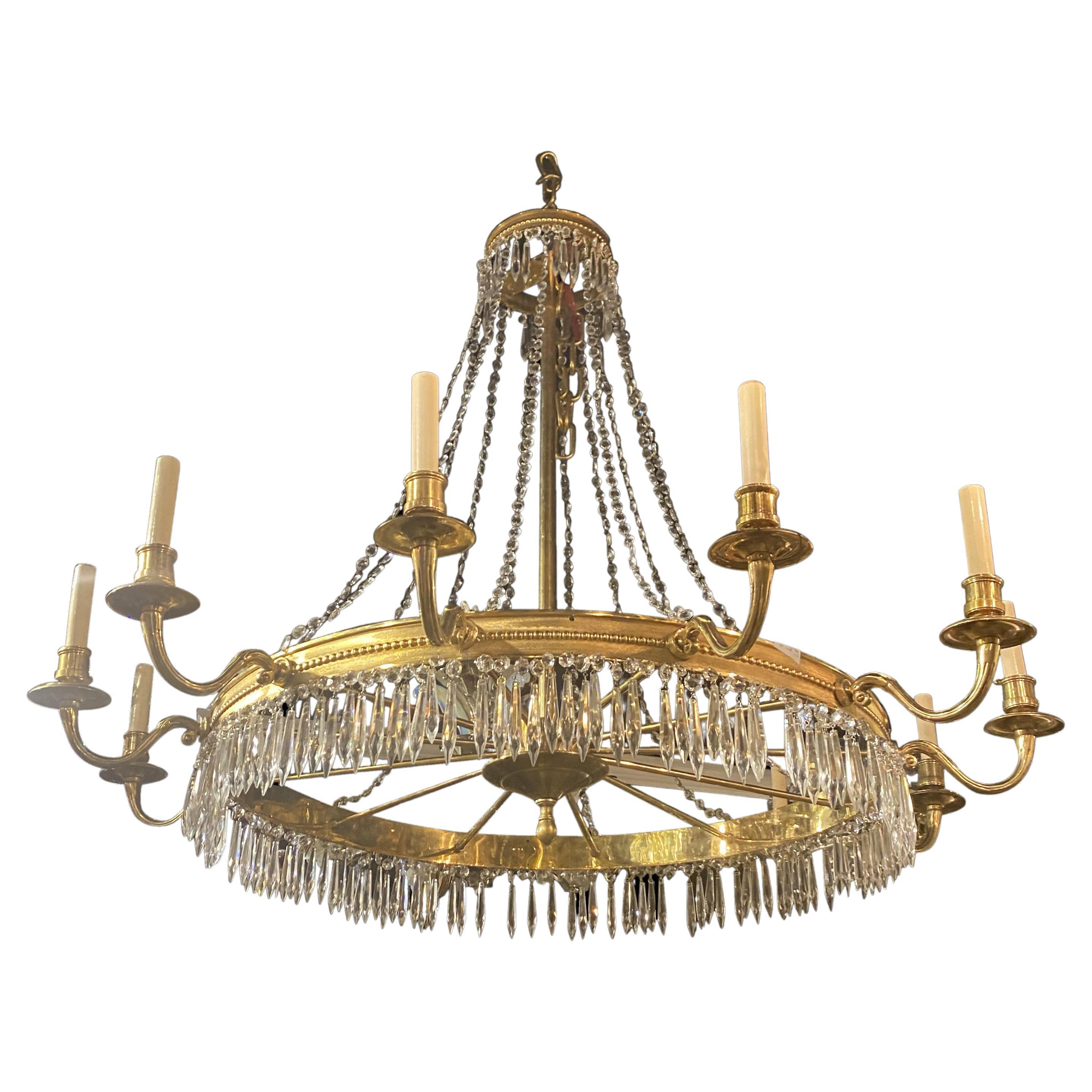 1930's French Gilt Bronze 12 lights Chandelier For Sale