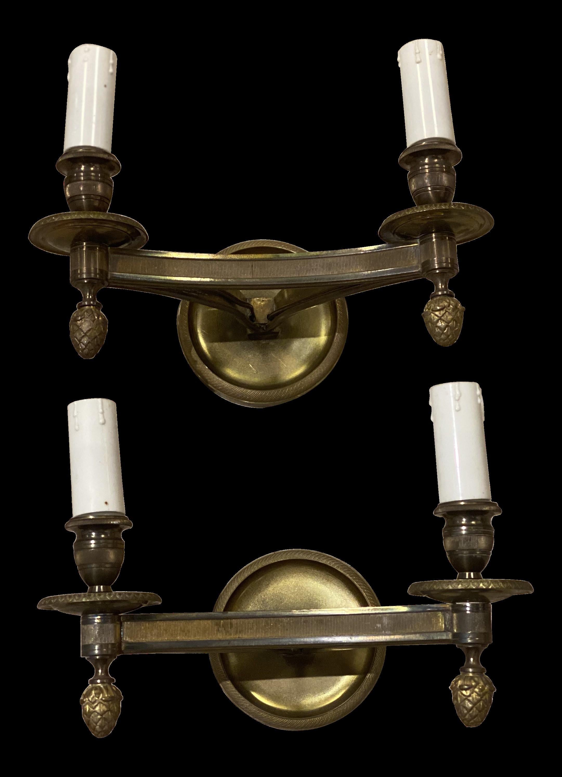 A pair of 1930's French Empire style gilt bronze sconces with triangle shape 