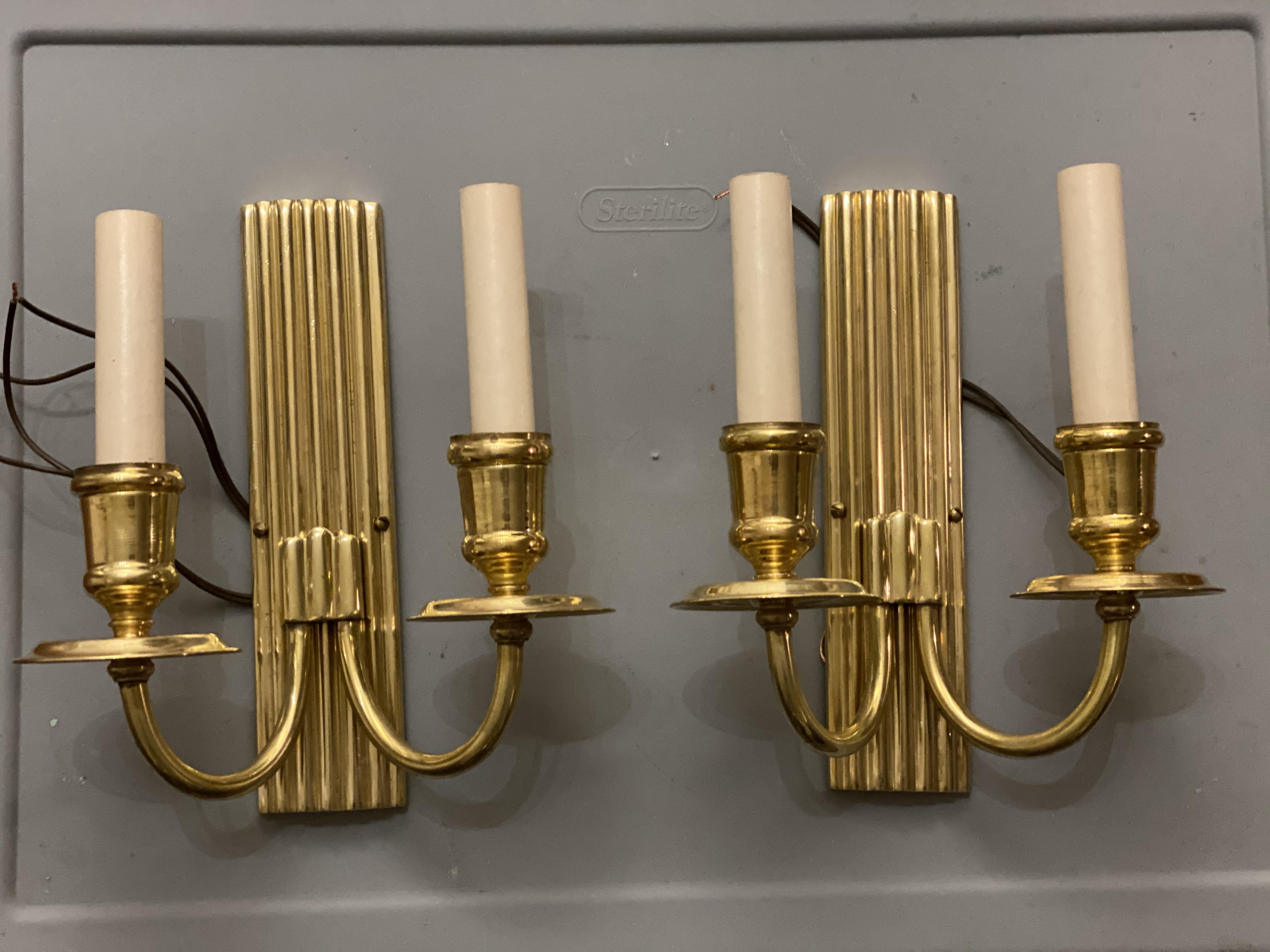 A pair of circa 1930's French gilt bronze sconces with two lights