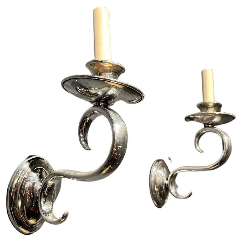 A pair of circa 1930's Italian silver plated sconces with scrolled arms
