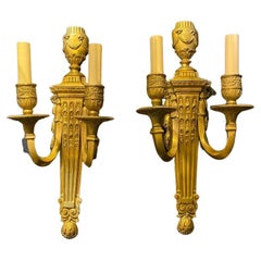 A pair of circa 1940's English gilt bronze sconces