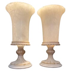 A pair of circa 1940's French carved alabaster Urns with interior light