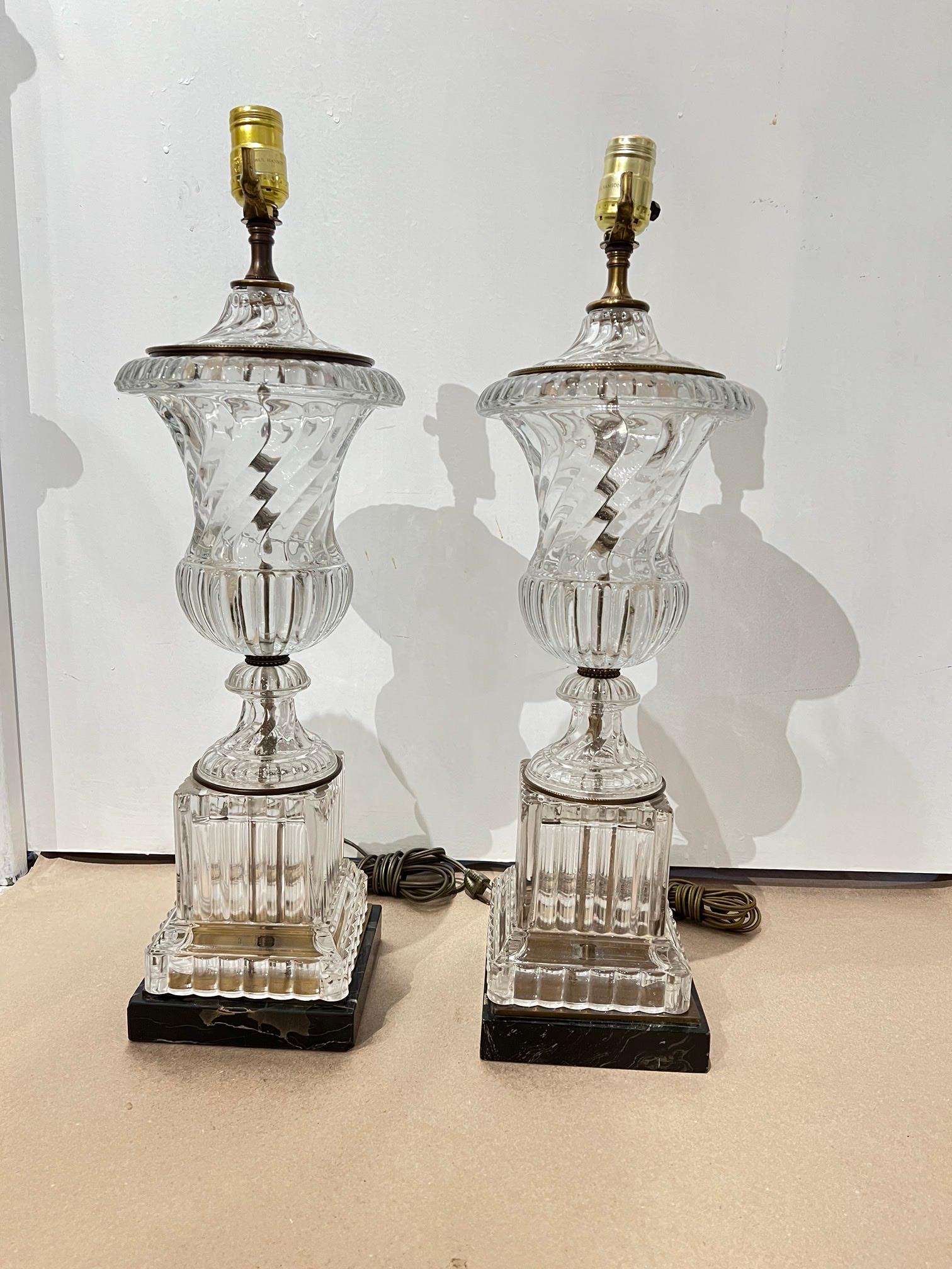 A pair of circa 1940's Paul Hanson crystal urn shaped table lamps