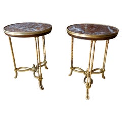 A pair of circular gueridons after Adam Weisweiler - maison Jansen circa 1900