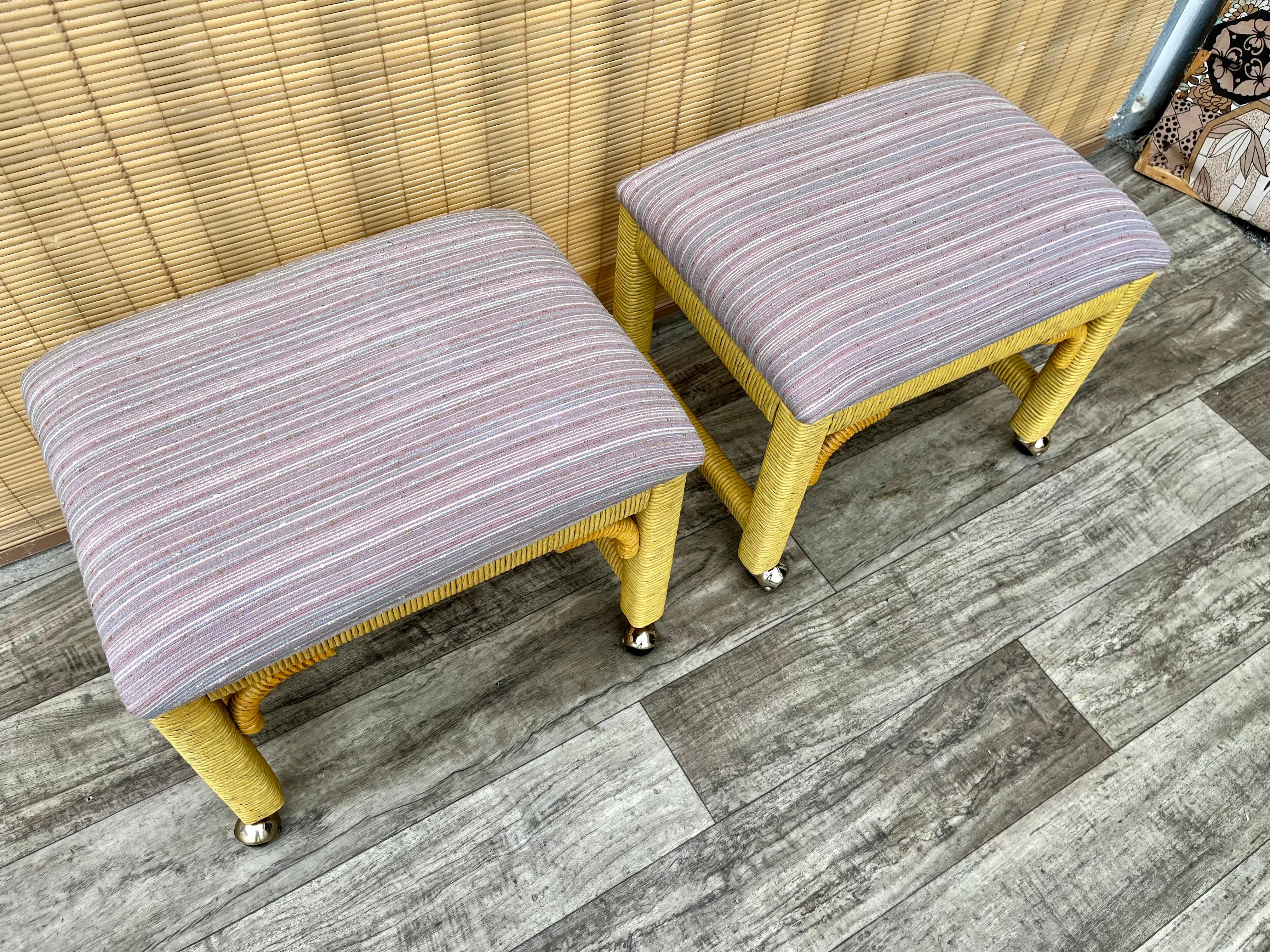 A Pair of Coastal Style Rolling Footstools on Casters by Henry Link Furniture. In Good Condition For Sale In Miami, FL
