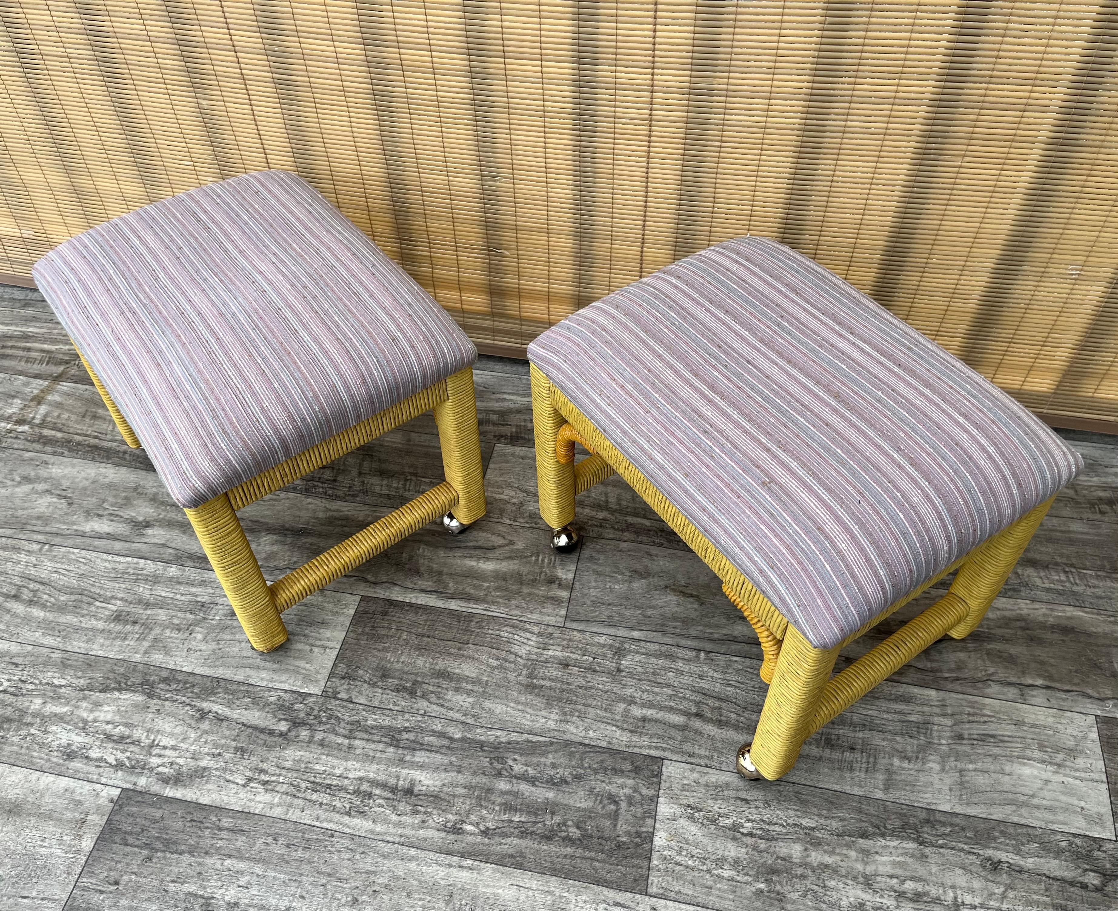 A Pair of Coastal Style Rolling Footstools on Casters by Henry Link Furniture. For Sale 1