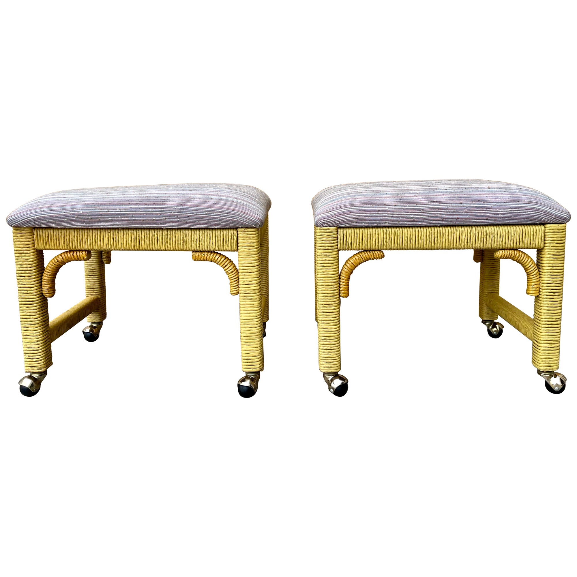 A Pair of Coastal Style Rolling Footstools on Casters by Henry Link Furniture.