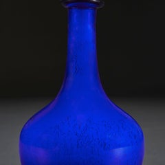 A Pair of Cobalt Blue Glass Bottle Table Lamps
