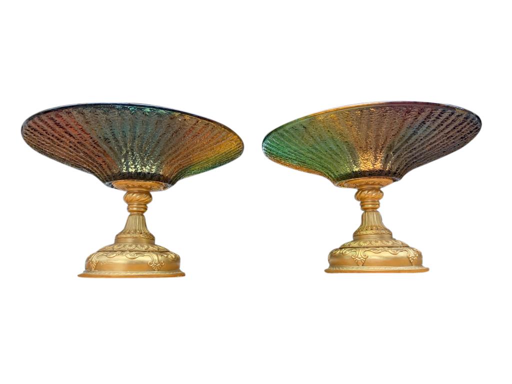 A pair of stunning and large color glass Tazze, with gold gilded bases, 20th century.

A tazza (Italian, 
