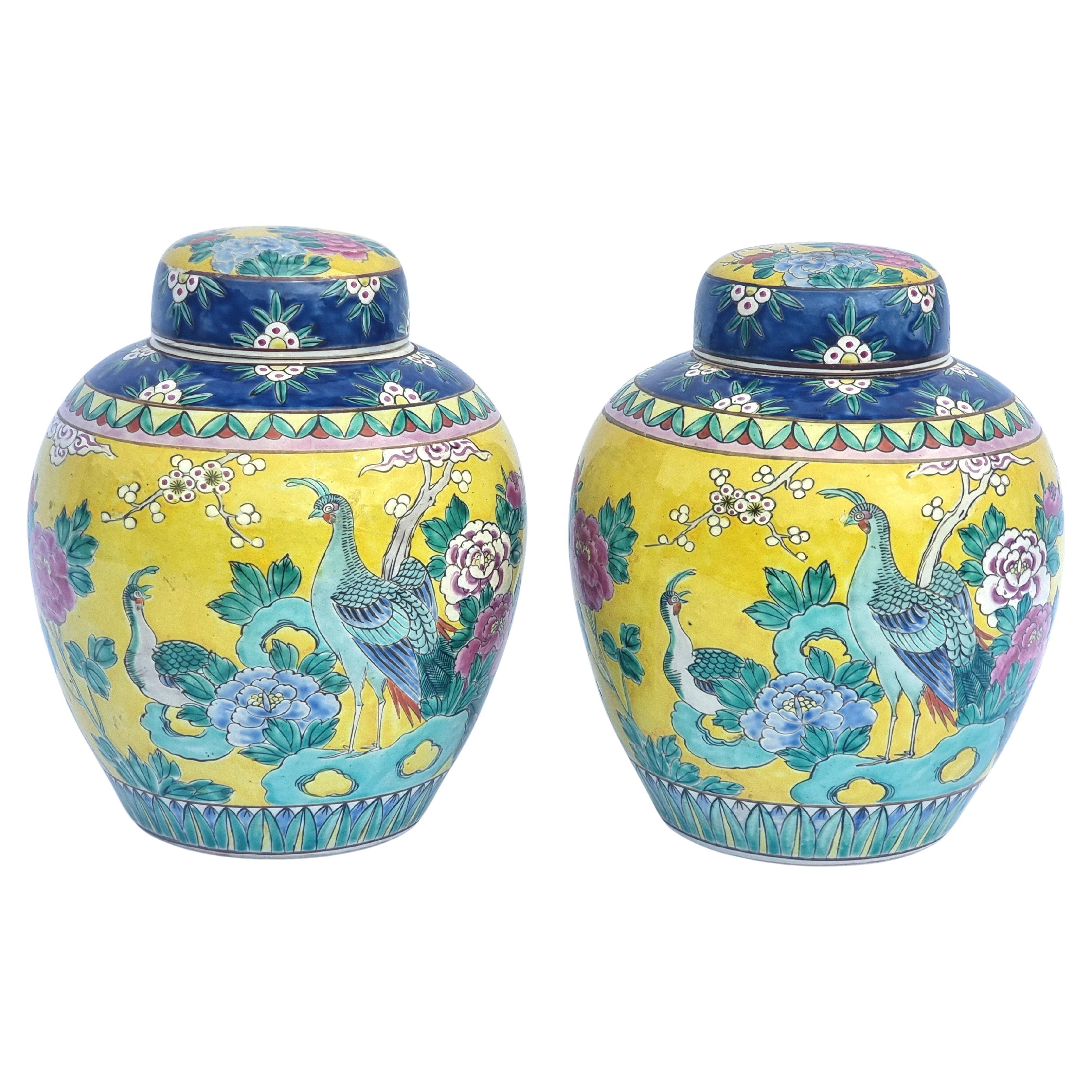 A pair of colourful  hand painted Chinese ginger jars with covers circa 1930
