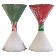 A pair of concrete Diabolo planters with charming painting