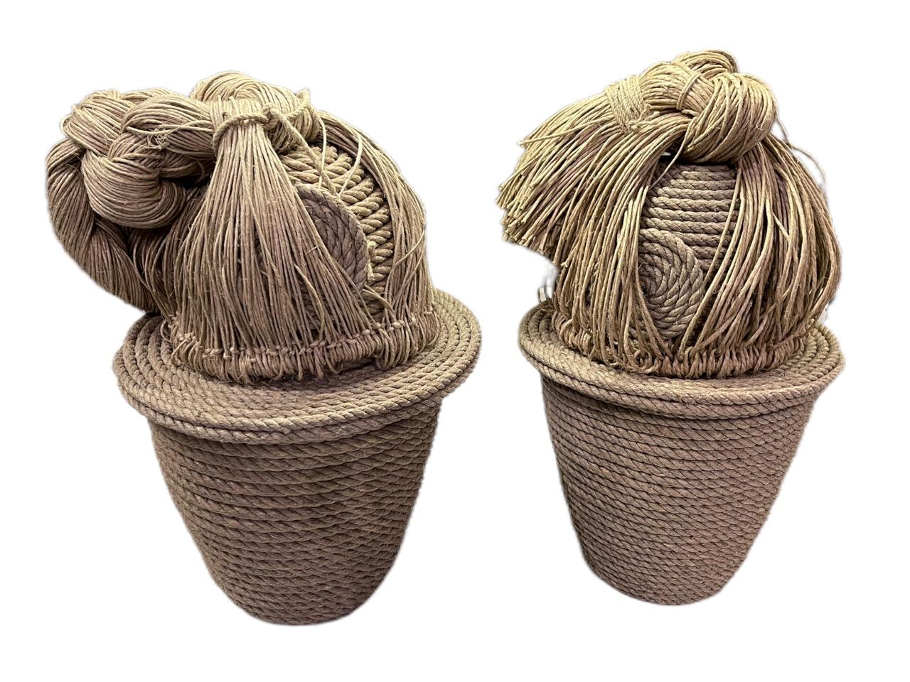 A pair of contemporary 21st Century French Christian Astuguevieille natural jute rope covered urns. These are decorative sculptures which are hand-made.