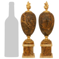 A pair of Continental 19th century Blue John and Ormolu trophies