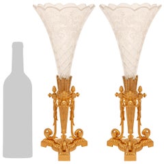 A pair of Continental 19th century Louis XVI st. etched Crystal and Ormolu vases