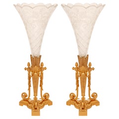 Antique A pair of Continental 19th century Louis XVI st. etched Crystal and Ormolu vases