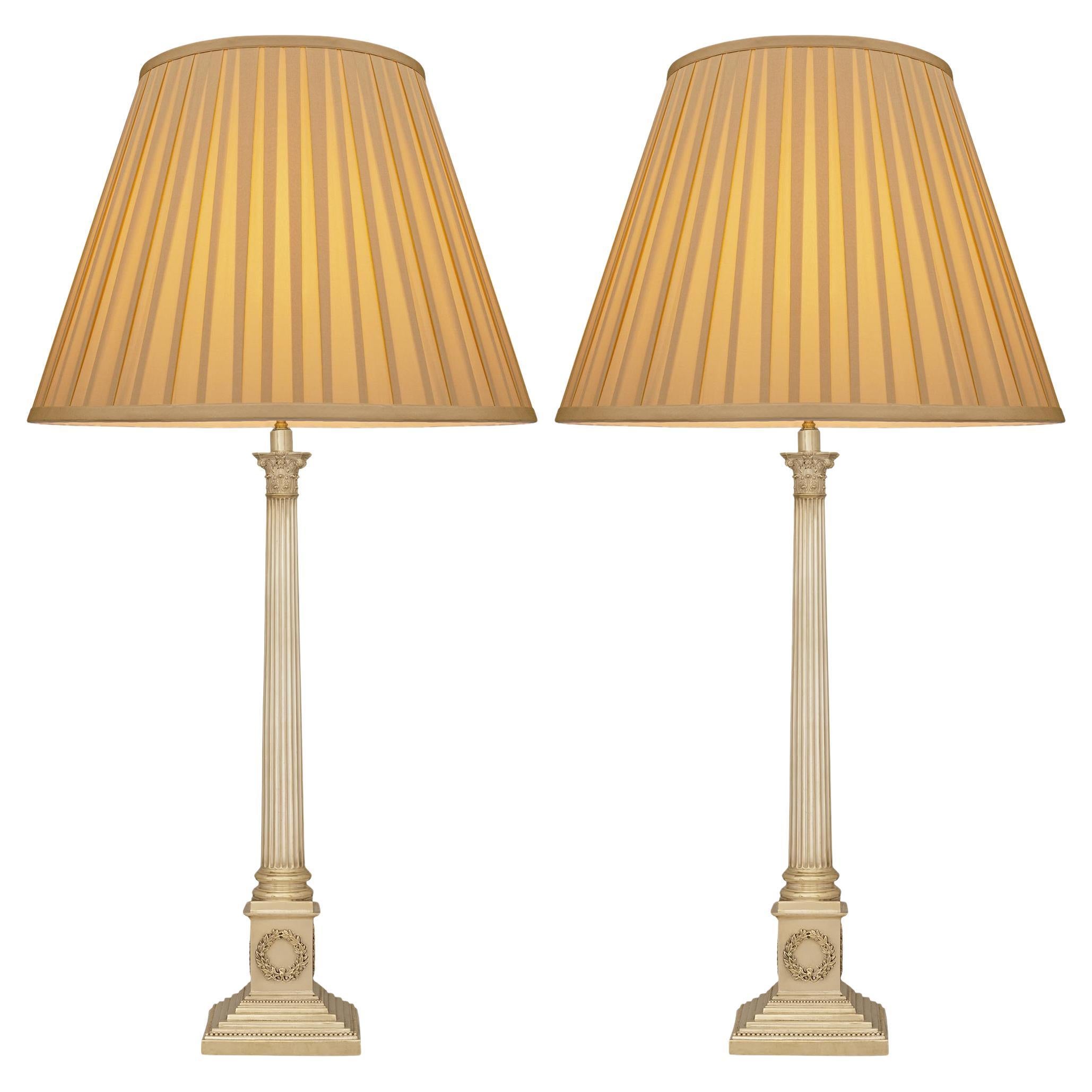 A pair of Continental 19th century Neo-Classical st. Silvered Bronze lamps For Sale