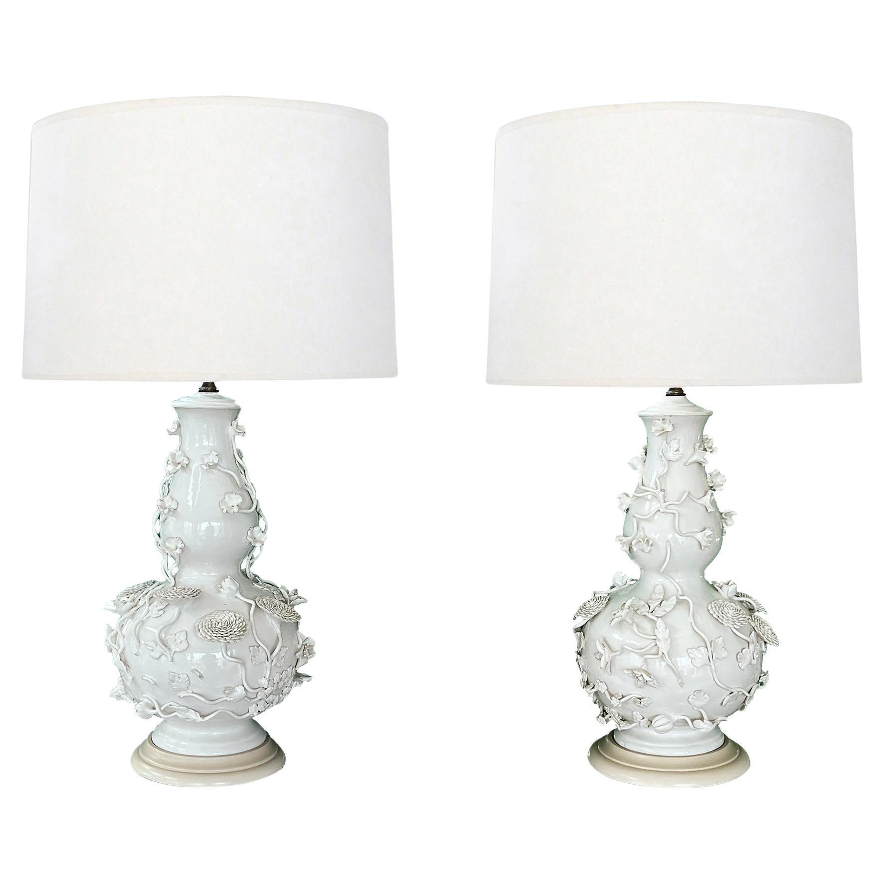 A Pair of Continental Blanc de Chine Porcelain Vases as Lamps For Sale