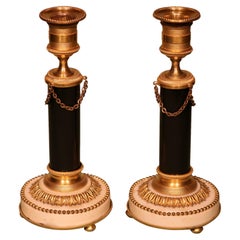 Pair of Continental Bronze and Ormolu and White Marble Candlesticks
