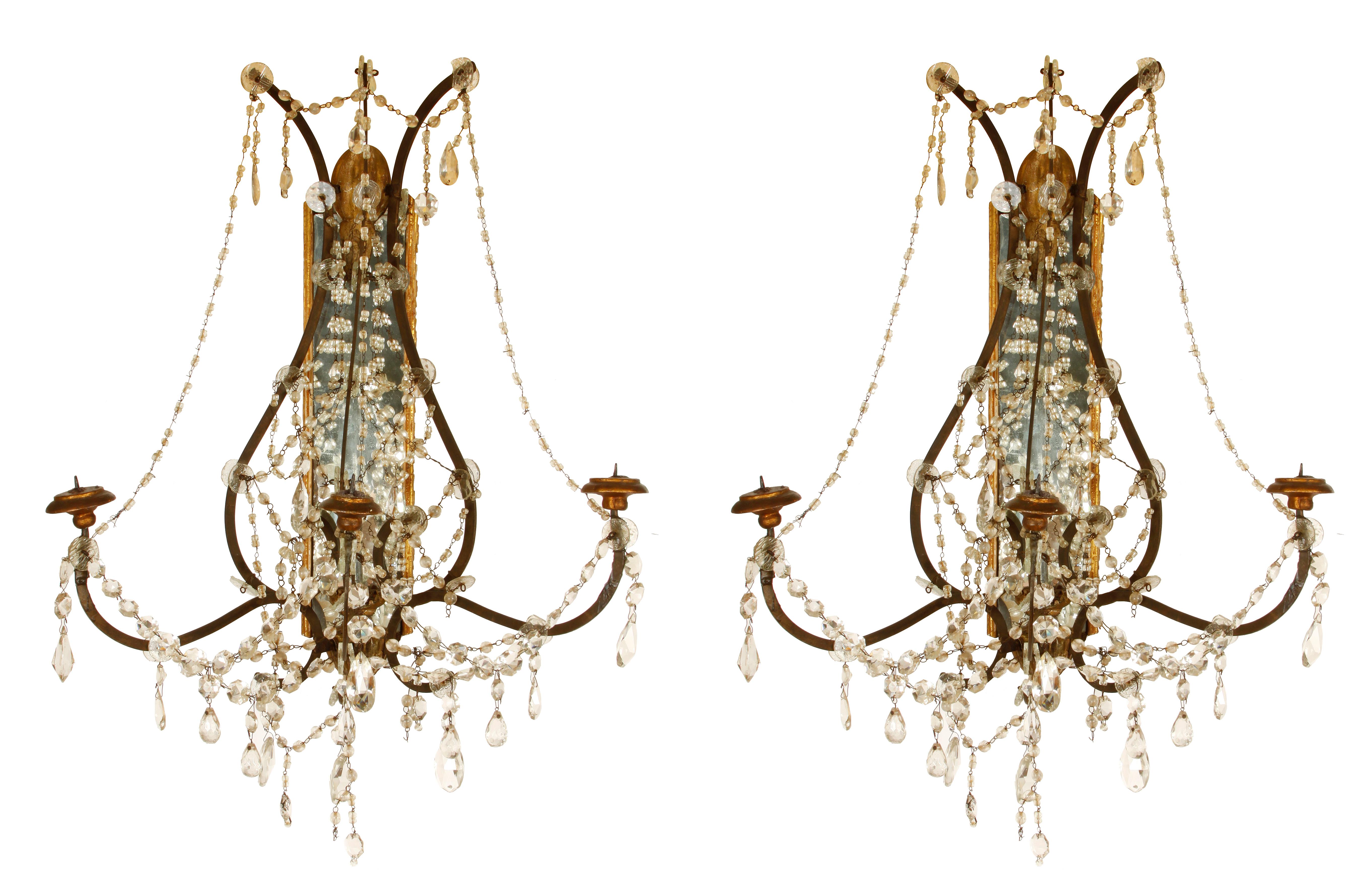 Pair of Continental Giltwood Wrought Iron Mirror Back Sconces In Good Condition In Locust Valley, NY