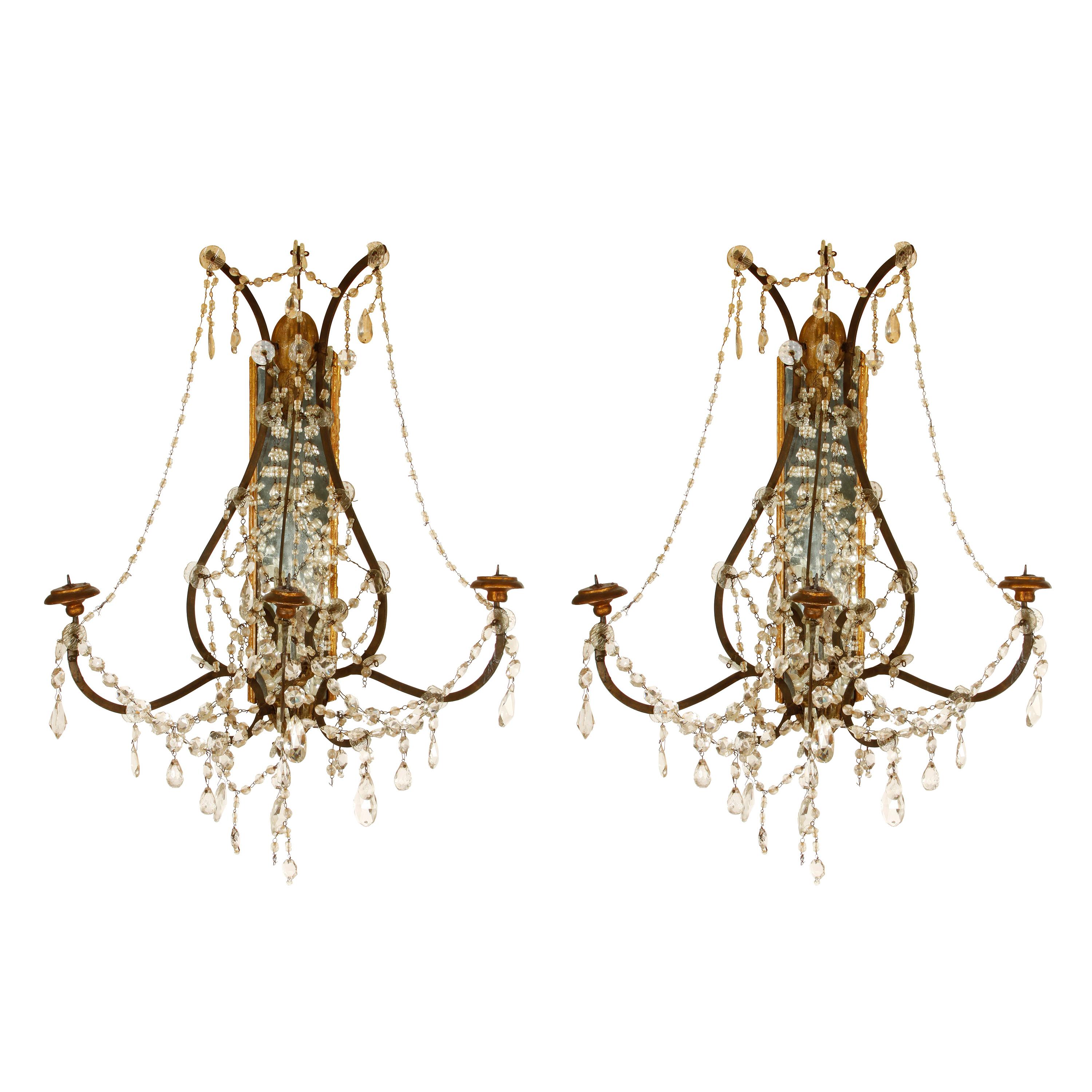 Pair of Continental Giltwood Wrought Iron Mirror Back Sconces