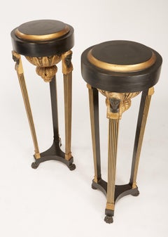 Pair of Continental Neoclassic Black Painted and Parcel-gilt Torcheres, Italian